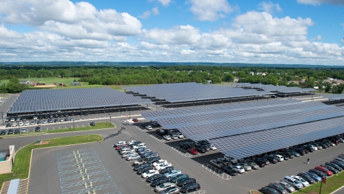 A parking lot covered with solar panels.
