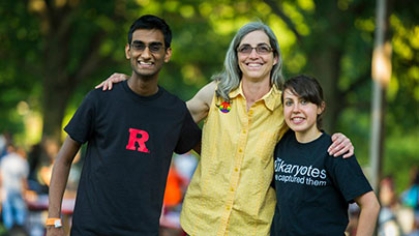 A dean with two students.