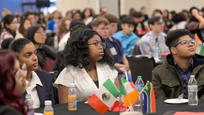 Students sitting at a table.