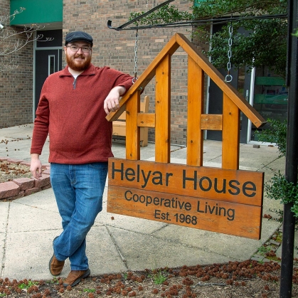 David LoBiondo standing next to the Helyar House sign.