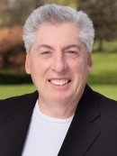 Michael De Luca headshot.